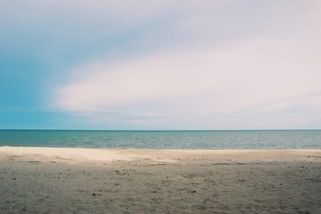 Fototapeta premium Landscape of beach and sea in Thailand with white sand and blue sky
