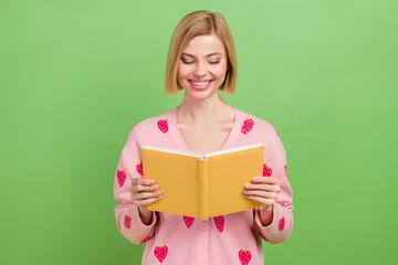 Photo portrait of pretty young girl hold opened book reading wear trendy pink strawberry print...