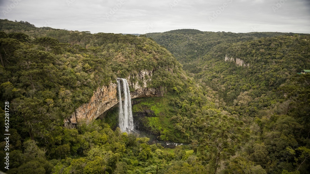 Canvas Prints scenic view of caracol waterfall surrounded by lush greenery. brazil.