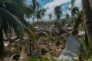 Of Typhoon Odette (Rai) in a coastal village in Southern Leyte, Philippines - obrazy, fototapety, plakaty