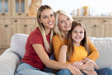 Family portrait of happy women mom, grandma and daughter