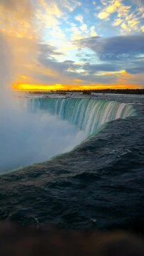 Vertical view of Niagara Falls at sunset