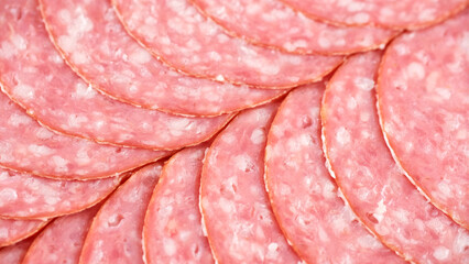 Sliced sausages, salami close up