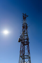telecommunication antenna against blue sky