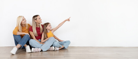 Family three woman sitting on floor, showing copy space, banner