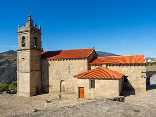 Romanesque church of Santa María de Barrô (12th century). The bell tower was built in the 19th century. Duero valley, Resende, Portugal. - obrazy, fototapety, plakaty