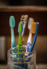 toothbrushes in a glass