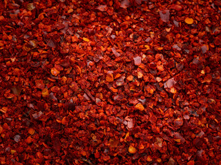 Crushed red pepper macro texture - obrazy, fototapety, plakaty