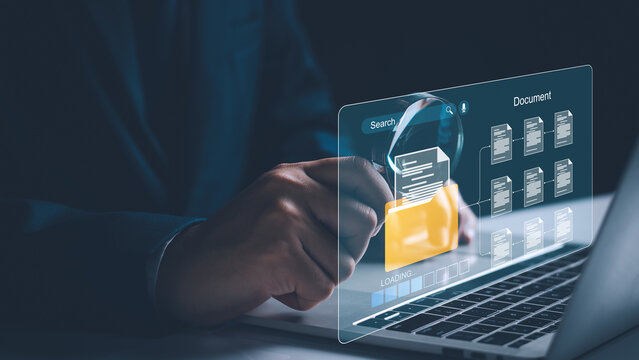 Document management and network system concept. Businessman use smart tablet loading documents in online archives ,Document management Storage and technology on digital document paperless operation.