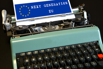 words 'Next Generation EU' on a blue background and european union logo typed on a vintage typewriter. The National Recovery and Resilience Plan is part of the Next Generation EU programme.