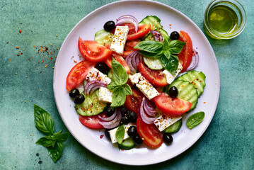 Traditional fresh vegetable greek salad. Top view with copy space.
