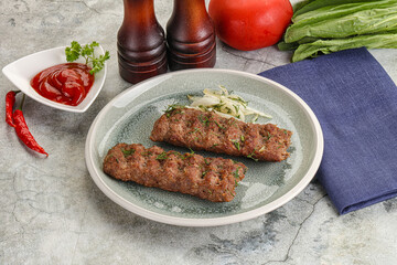 Kebab with beef served onion