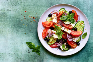 Traditional fresh vegetable greek salad. Top view with copy space.