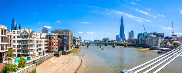 Tafelkleed Scenic colorful Thames river waterfront in London panoramic view © xbrchx