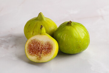 Ripe sweet juicy green fig heap