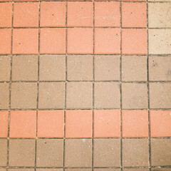 abstract background with Paving block pattern. Street cement block floor background. Old cobblestone road top view. Pavement texture. paving blocks for roads, simple paving block patterns