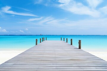 Fototapeta na wymiar Amazing travel landscape concept. Beautiful best tropical Maldives island and wooden pier pathway. Sunny beach sea bay coconut palm trees on blue sky for nature holiday vacation background concept