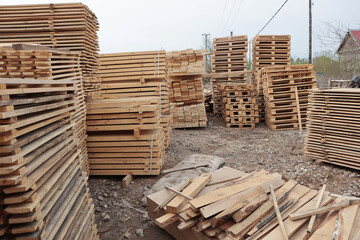 Wooden pallets for transporting building materials.Wooden Pallet Stack for Industrial and Transport supply chain.