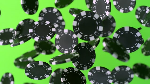 Super Slow Motion Shot of Casino Chips Explosion Towards Camera on Green Screen at 1000fps.