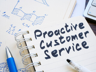 Proactive customer service marks on notebook.