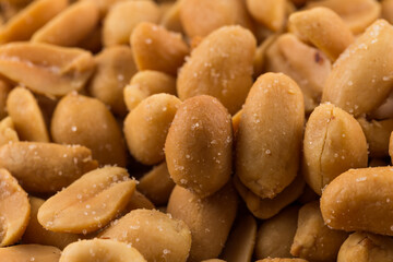 large amount of peeled salted peanuts