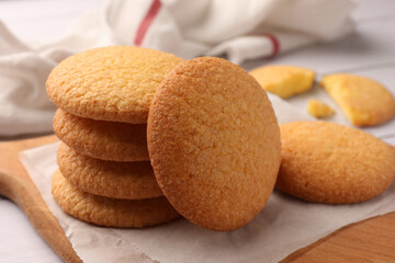 Delicious Danish butter cookies on wooden board, closeup