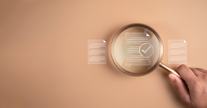 Document quality control concept. Magnifying glass focus on correct sign mark with document approve paperless and quality assurance approve. Rules of conduct and policies.