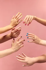  Beautiful female hands with different manicure, nail colors against pink background. Taking care. Concept of hand care, cosmetics and cosmetology, spa, natural beauty. Poster, ad © master1305