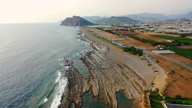 Gazipasa district of Antalya province, seascape, amazing Koru beach, with natural swimming pools. Aerial view.