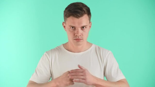 Angry man demonstrate negative emotions, indignation, ire, unfriendliness and hostility. Guy shows bad mood, angry and ready to the attack and fight. The guy demonstrates courage and power to