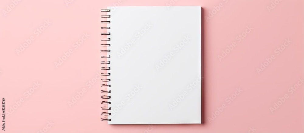Poster multiple notebooks arranged flat on a isolated pastel background copy space