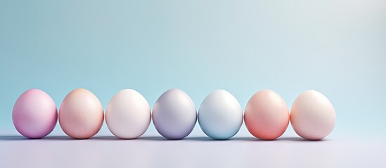 Top view of pastel Easter eggs in a row on a isolated pastel background Copy space