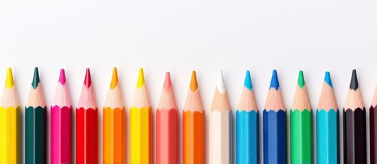 Close up shot of vibrant colored pencils on isolated pastel background Copy space