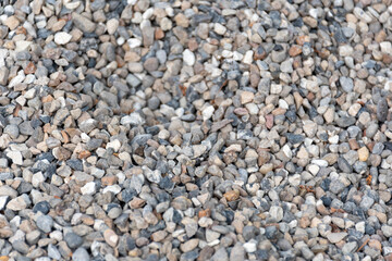 Natural background of small pebbles. Stone texture.