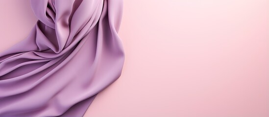 Colorful hijab folded on a isolated pastel background Copy space a trendy accessory for women