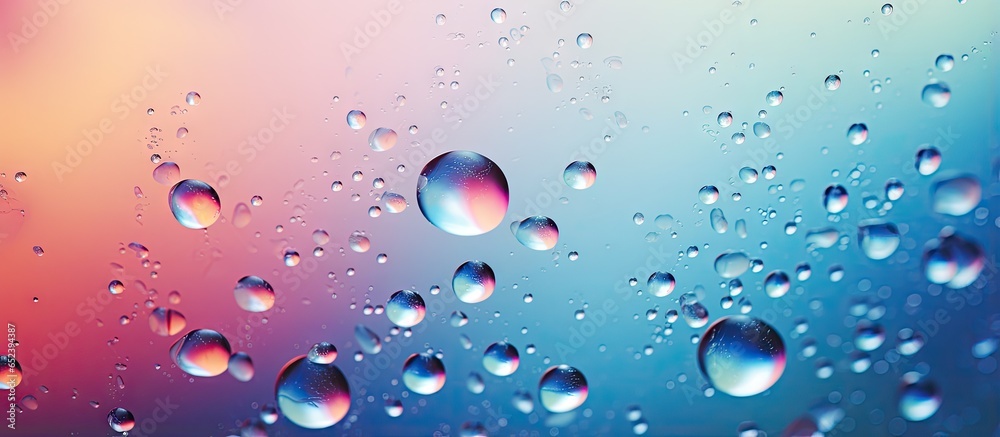 Aufkleber colored abstractions created by backlit water droplets on glass magnified with bokeh isolated pastel