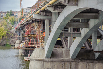 New concrete arches and wooden formwork for the reconstruction of the bridge
