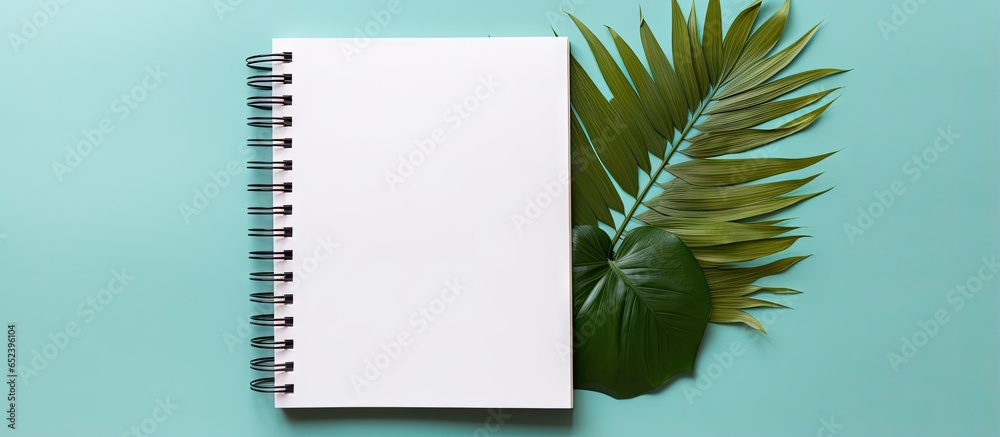 Poster multiple notebooks arranged flat on a isolated pastel background copy space