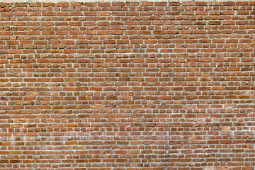 Red brick wall.  Background of old vintage wall texture
