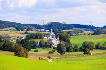 Fototapeta na wymiar Pilgrimage church Maria Birnbaum in Sielenbach in Bavaria on a sunny day with blue sky