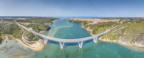 Panoramic view of the freeway bridge over the Rio Mira near the town of Bairro Monte Vistoso