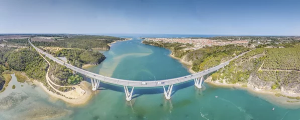 Papier Peint photo autocollant Atlantic Ocean Road Panoramic view of the freeway bridge over the Rio Mira near the town of Bairro Monte Vistoso