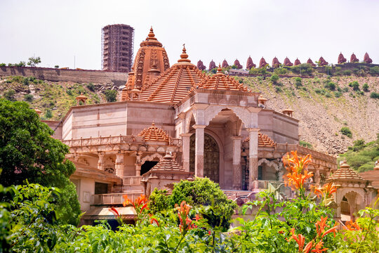 artistic red stone jain temple at morning from unique angle