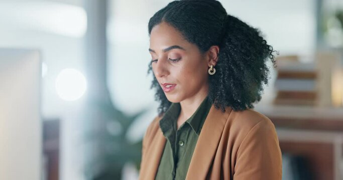 Girl at computer in office, thinking and reading email report, feedback review or article at digital agency. Internet, research and woman at tech startup networking, writing schedule or admin project
