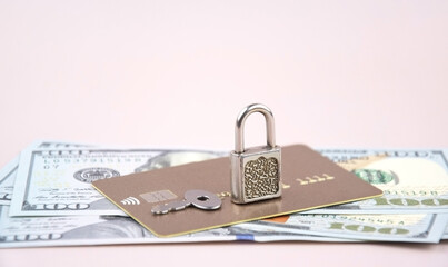 Financial fraud protection concept: credit card, padlock and master key.