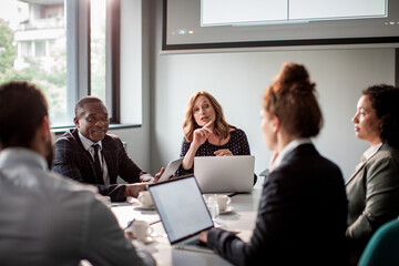 Diverse group of business people having a meeting in the conference room