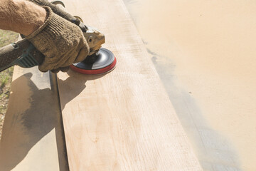 Grinding of an oak board with an angle grinder