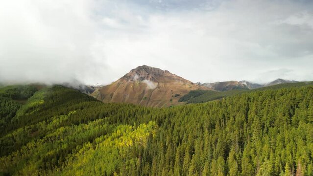 Aerial of Teocalli Mountain in Crested Butte Colorado in autumn with rocky ridgeline