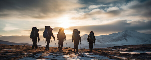 Group of friends embarking on a winter hiking expedition - obrazy, fototapety, plakaty
