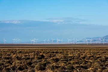 Foggy Mountain Wind Turbines at Dawn: Spectacular Yellow Sunset in 4K